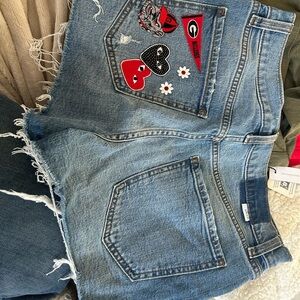 Trendy Blue Denim Women's Shorts with University of Georgia patches